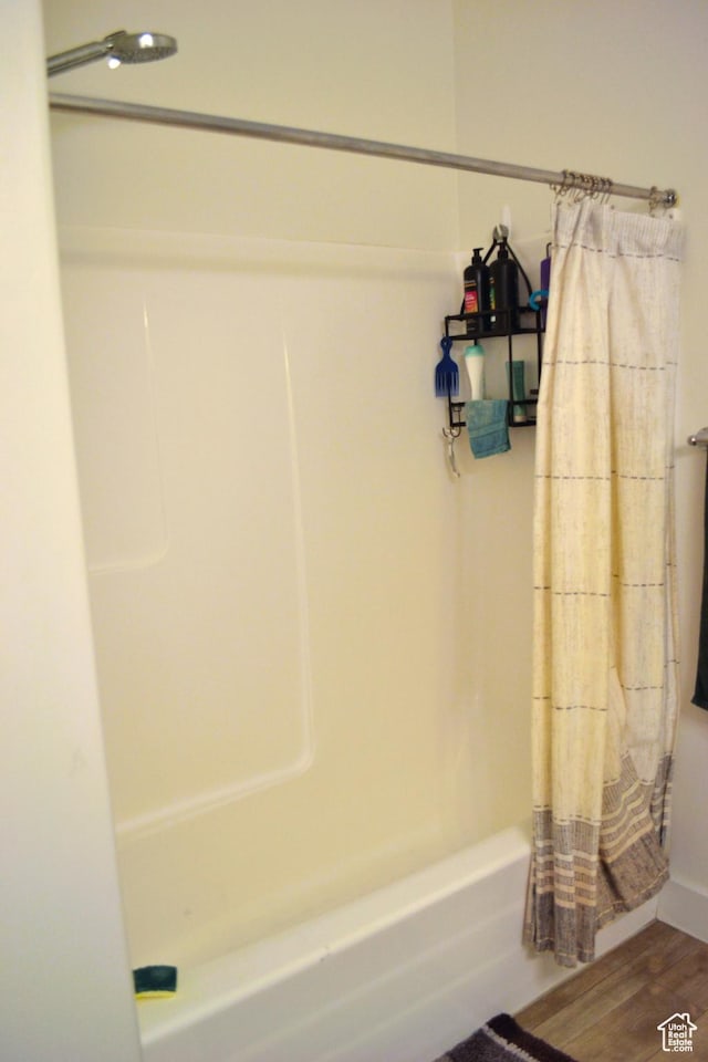 680 N 380 W Unit Z303, Vineyard, UT 84059 - bathroom featuring shower / bath combo and wood finished floors