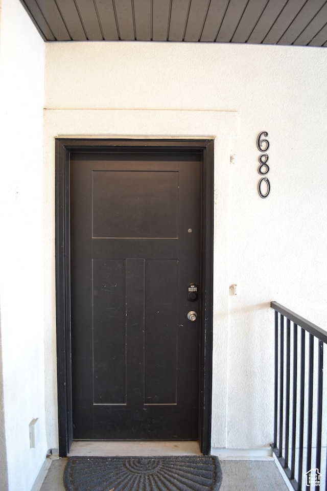 680 N 380 W Unit Z303, Vineyard, UT 84059 - view of exterior entry featuring stucco siding and a balcony