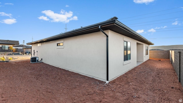 1391 S Padre Bay Dr Unit 4075, Washington, UT 84780 - view of side of property with stucco siding and a fenced backyard