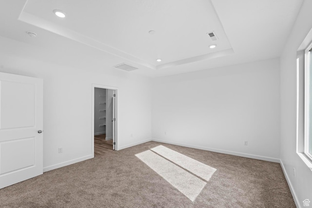 1391 S Padre Bay Dr Unit 4075, Washington, UT 84780 - unfurnished bedroom featuring a raised ceiling, carpet flooring, recessed lighting, and multiple windows