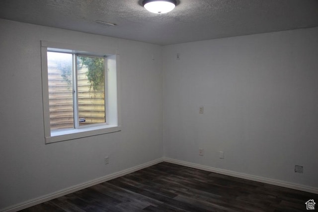41 W 770 N, Santaquin, UT 84655 - empty room featuring a textured ceiling and dark wood-type flooring