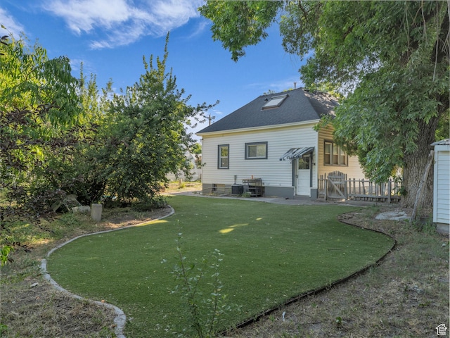 235 N 300 W, Smithfield, UT 84335 - back of property with a gate and a shingled roof