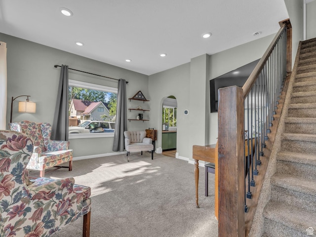 235 N 300 W, Smithfield, UT 84335 - living area featuring arched walkways, carpet floors, recessed lighting, and stairs
