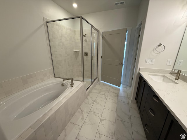 22 S 3830 W Unit 422, West Point, UT 84015 - bathroom with marble finish floors, a garden tub, a shower stall, vanity, and recessed lighting