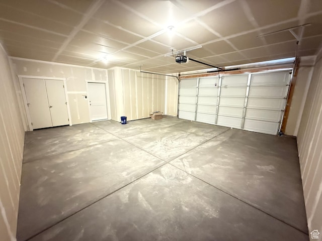 22 S 3830 W Unit 422, West Point, UT 84015 - garage featuring a garage door opener