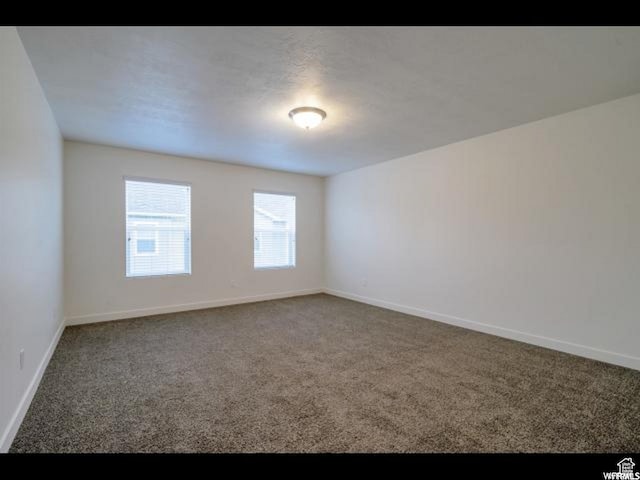 96 E 670 N, Vineyard, UT 84059 - unfurnished room with carpet and baseboards