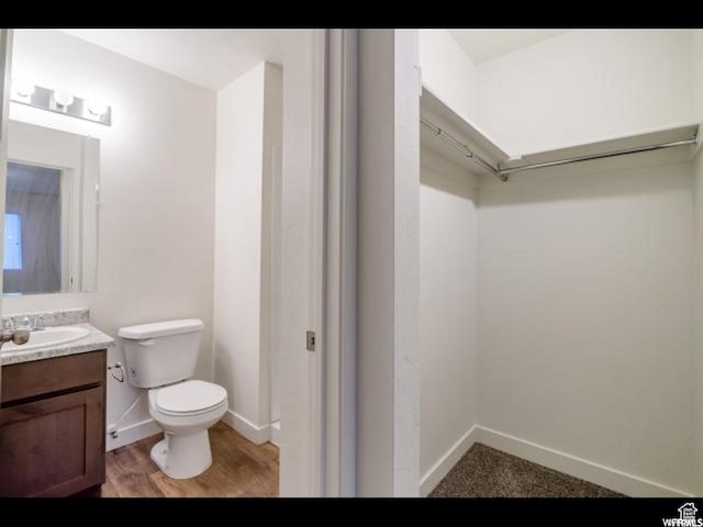 96 E 670 N, Vineyard, UT 84059 - bathroom featuring vanity and wood finished floors