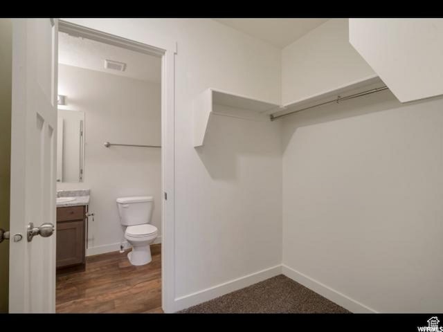 96 E 670 N, Vineyard, UT 84059 - bathroom featuring vanity and wood finished floors