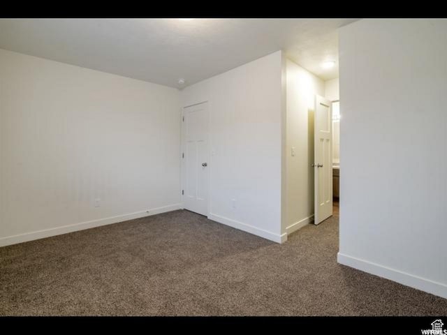 96 E 670 N, Vineyard, UT 84059 - carpeted spare room with baseboards