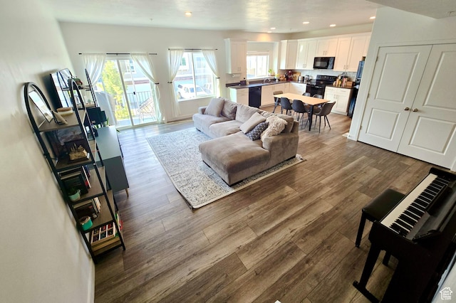5381 W Mount Maclure Pl, Herriman, UT 84096 - living room featuring recessed lighting and dark wood-type flooring