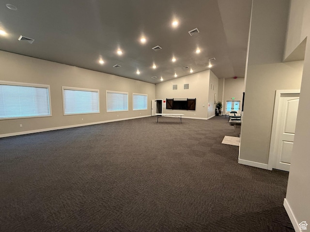 1768 W 300 S Unit D, Springville, UT 84664 - unfurnished living room featuring dark colored carpet and vaulted ceiling