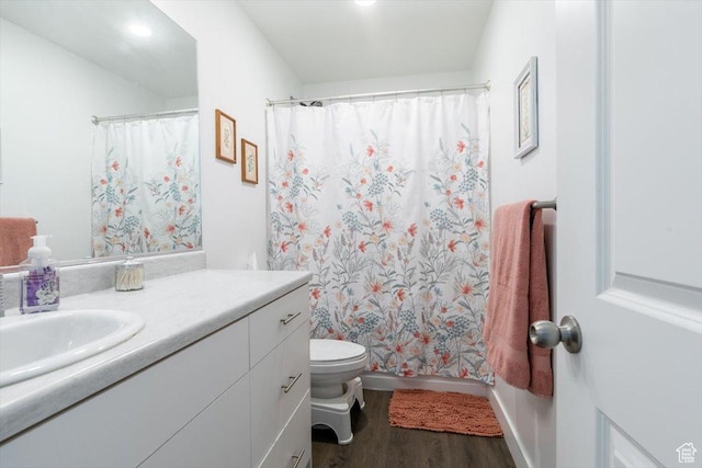 415 W 15 S, Providence, UT 84332 - bathroom featuring wood finished floors, vanity, and a shower with shower curtain