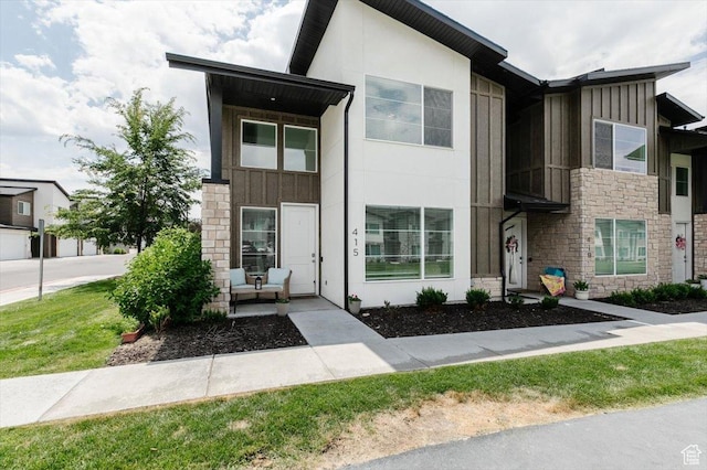 415 W 15 S, Providence, UT 84332 - contemporary house featuring board and batten siding and stone siding