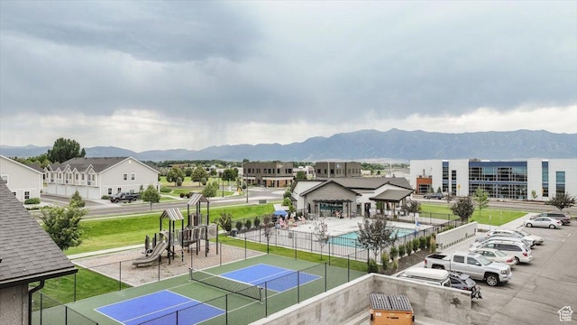 415 W 15 S, Providence, UT 84332 - view of tennis court with a mountain view and a community pool