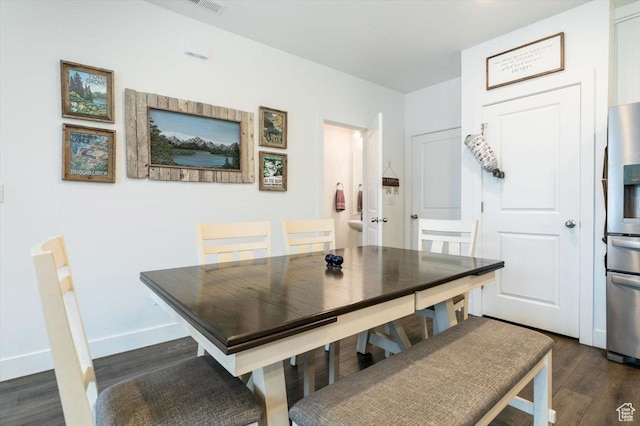 415 W 15 S, Providence, UT 84332 - dining space with dark wood-style floors and baseboards