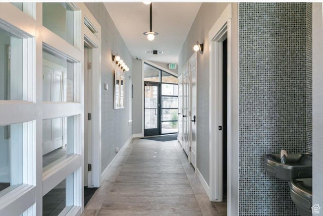 415 W 15 S, Providence, UT 84332 - hall featuring light wood-style flooring and french doors