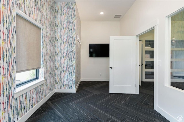 415 W 15 S, Providence, UT 84332 - unfurnished bedroom featuring wallpapered walls, carpet, recessed lighting, and an accent wall