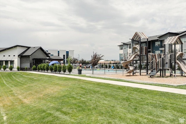 415 W 15 S, Providence, UT 84332 - community playground featuring a lawn and a community pool