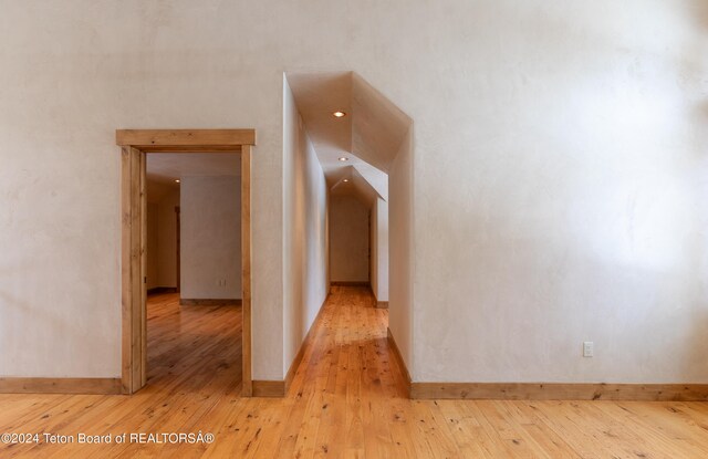 corridor featuring light wood-type flooring