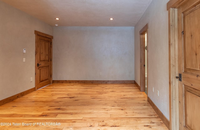 empty room featuring light hardwood / wood-style floors