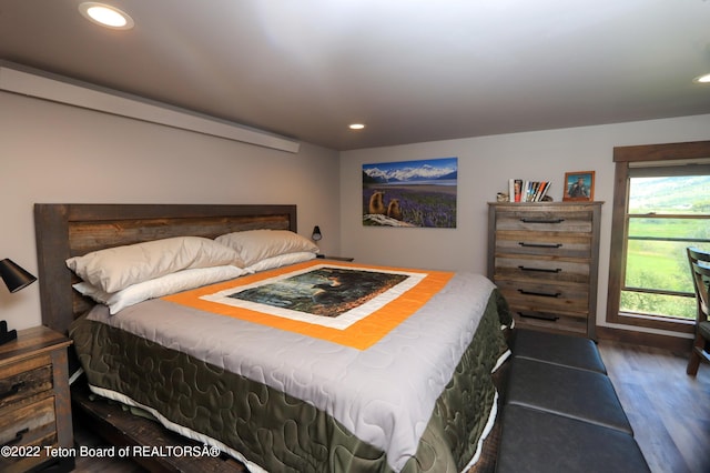 bedroom featuring dark hardwood / wood-style floors