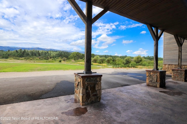 view of patio with a mountain view