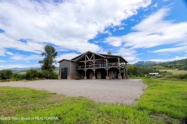 exterior space featuring a mountain view