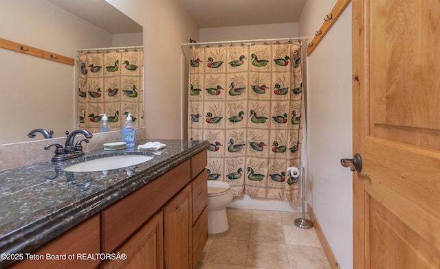 1515 Table Rock Dr, Driggs, ID 83422 - full bathroom featuring vanity, toilet, and tile patterned flooring