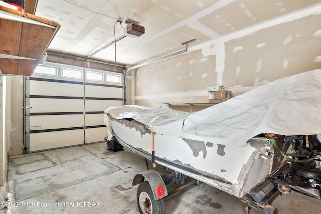 garage featuring a garage door opener