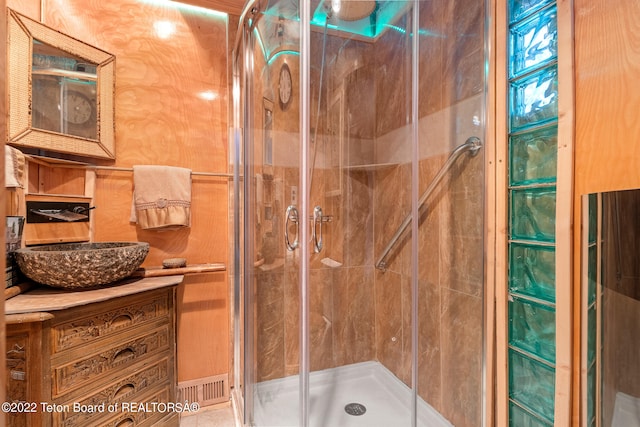 bathroom with vanity and walk in shower