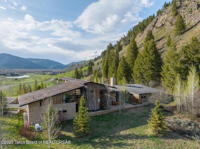 exterior space featuring a mountain view