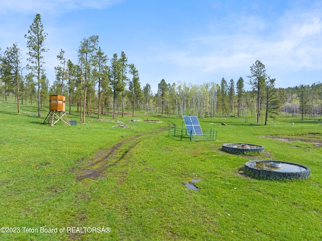 view of playground with a yard