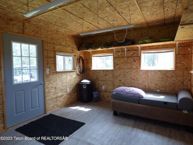 interior space with hardwood / wood-style flooring and a healthy amount of sunlight