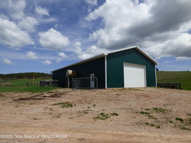 view of outdoor structure with a garage