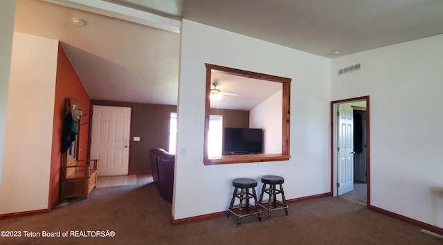 carpeted empty room with ceiling fan