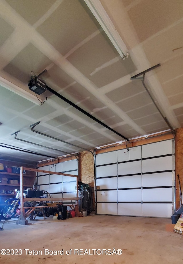 garage featuring a garage door opener