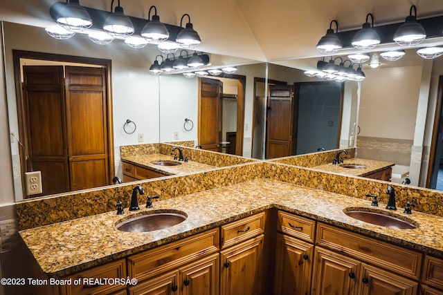 bathroom featuring double vanity