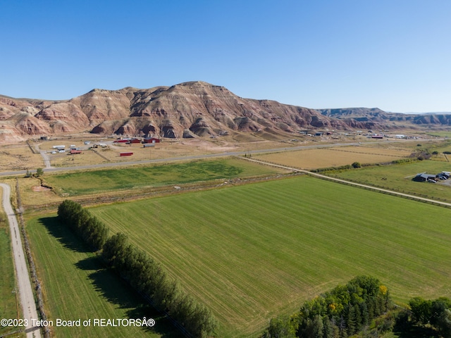 view of mountain feature with a rural view