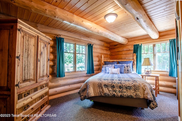 carpeted bedroom featuring log walls, multiple windows, and wood ceiling