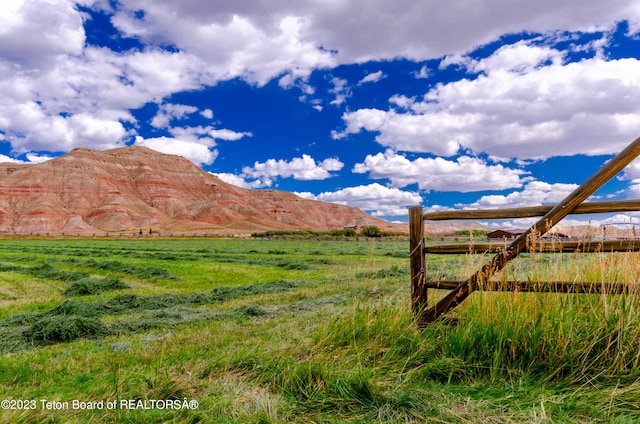 property view of mountains featuring a rural view