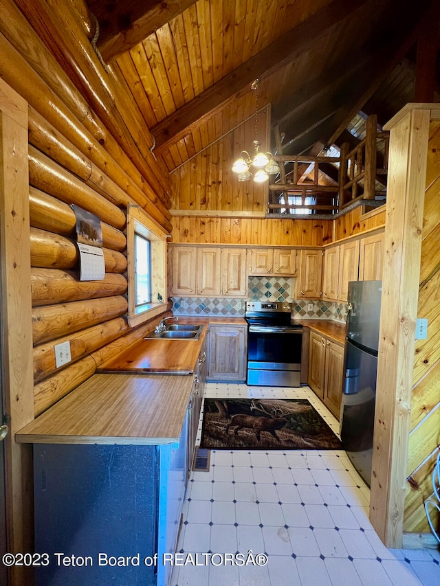 kitchen with fridge, beamed ceiling, stainless steel electric stove, light tile flooring, and a notable chandelier