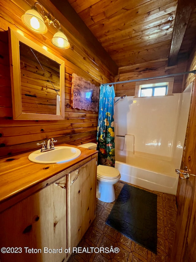 full bathroom with wooden ceiling, wood walls, toilet, shower / bath combo, and vanity