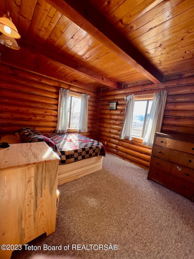 unfurnished bedroom with wood ceiling, dark colored carpet, log walls, and beamed ceiling