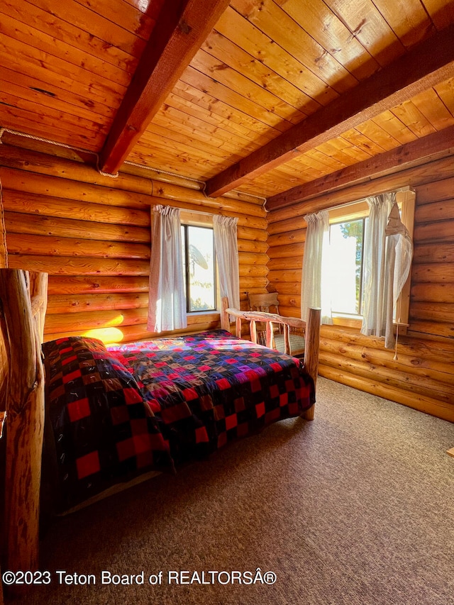 carpeted bedroom with beam ceiling, log walls, and wood ceiling