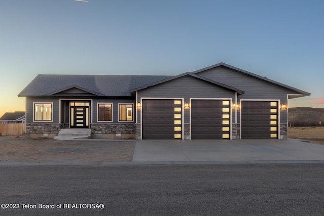 view of front of property featuring a garage