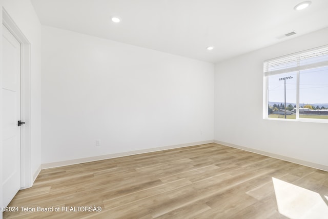 empty room featuring light hardwood / wood-style floors