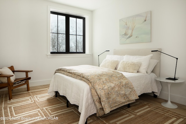 bedroom featuring hardwood / wood-style floors