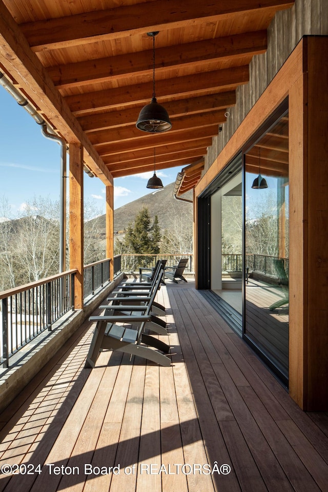 wooden deck with ceiling fan