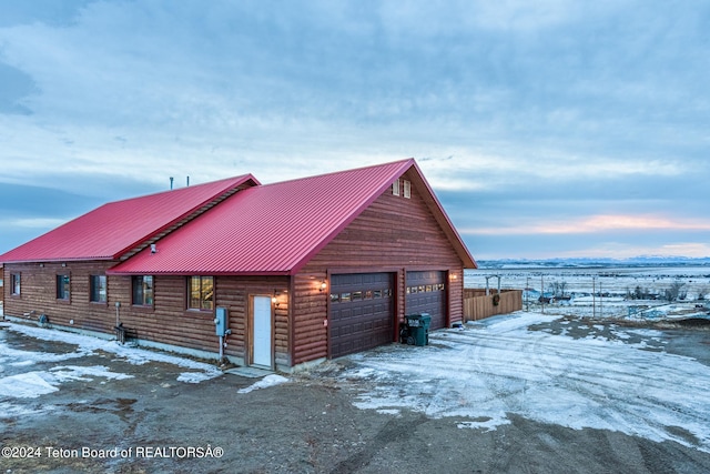 view of snow covered property