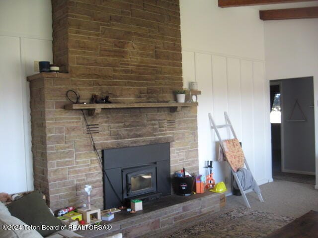 interior details with beam ceiling and carpet